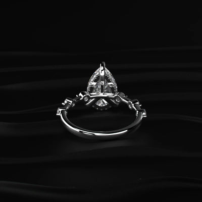 Pear Shaped Diamond Ring With Spaced Stone | Earthly Jewels   