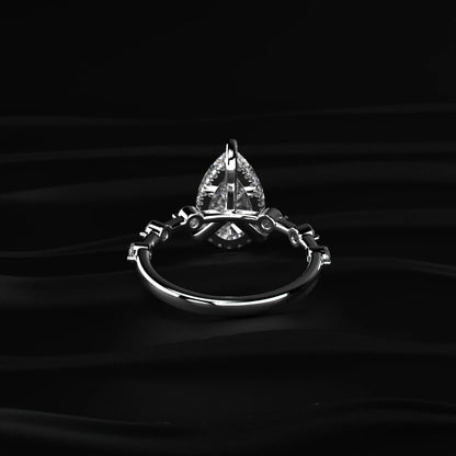 Pear Shaped Diamond Ring With Spaced Stone | Earthly Jewels   