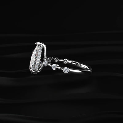 Pear Shaped Diamond Ring With Spaced Stone | Earthly Jewels   