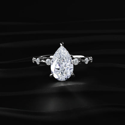 Pear Shaped Diamond Ring With Spaced Stone | Earthly Jewels   