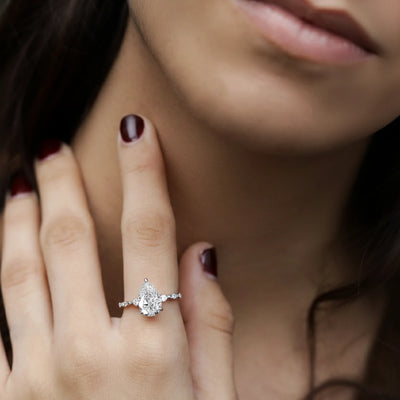 Pear Shaped Diamond Ring With Spaced Stone | Earthly Jewels  | Model image