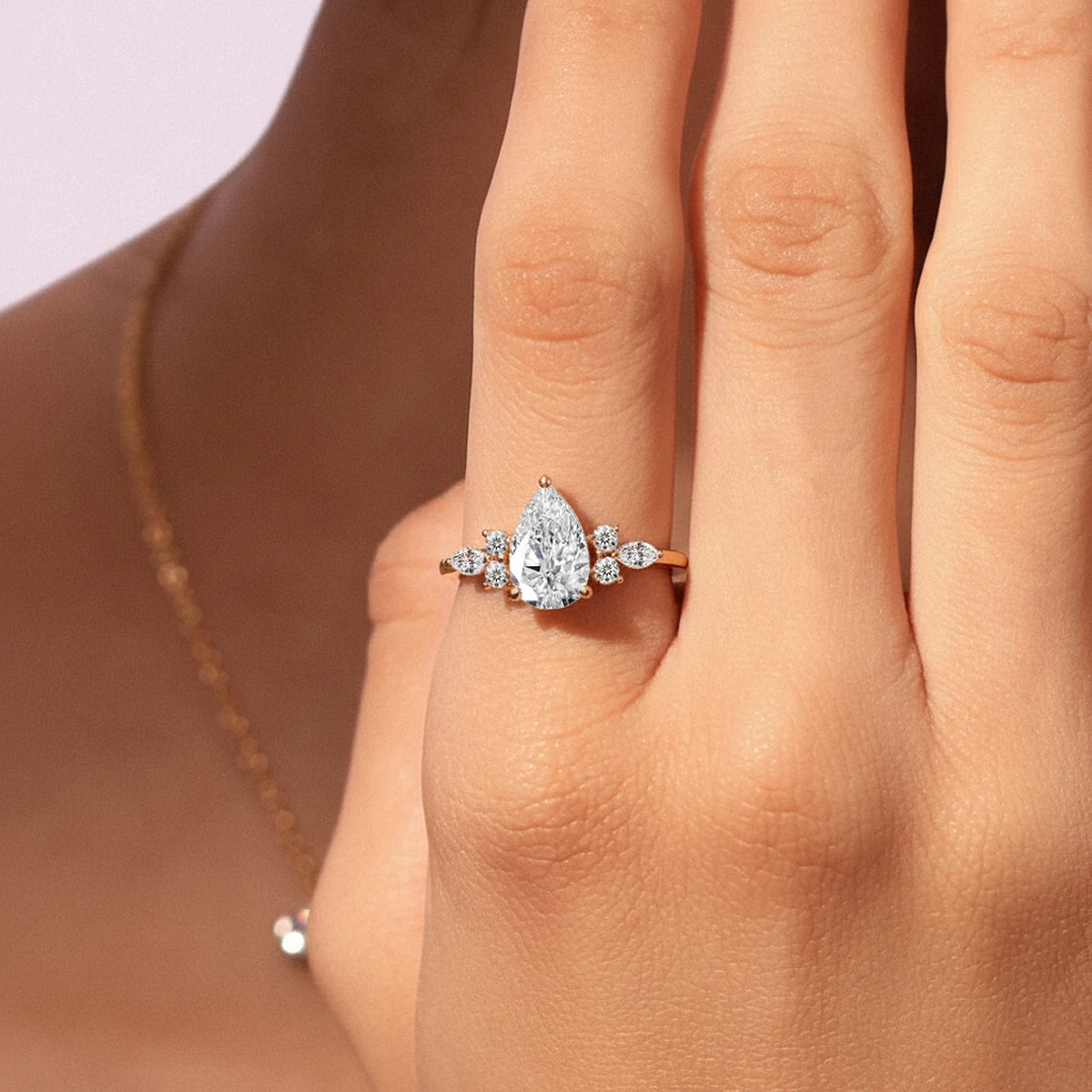 Pear Shape Lab Grown Diamond Ring With Accent Stones | Earthly Jewels  | Model image  