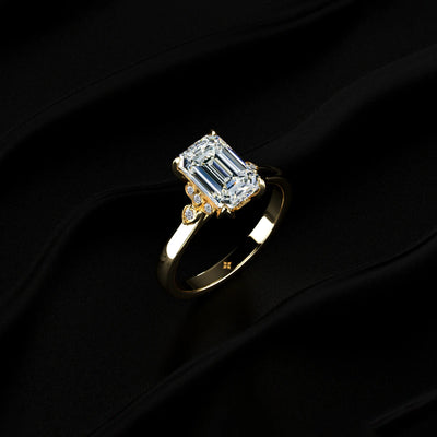 Emerald Cut Diamond Ring With Side Stones | Earthly Jewels   