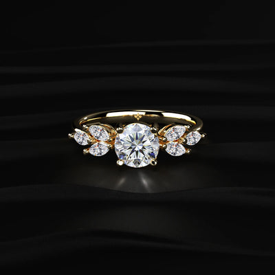 Round Diamond Solitaire Ring with Marquise Side Stones