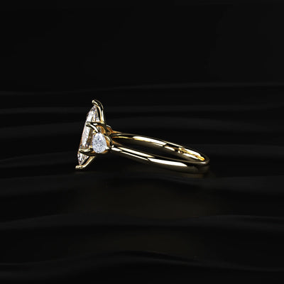 Diamond Ring with Pear Side Stones