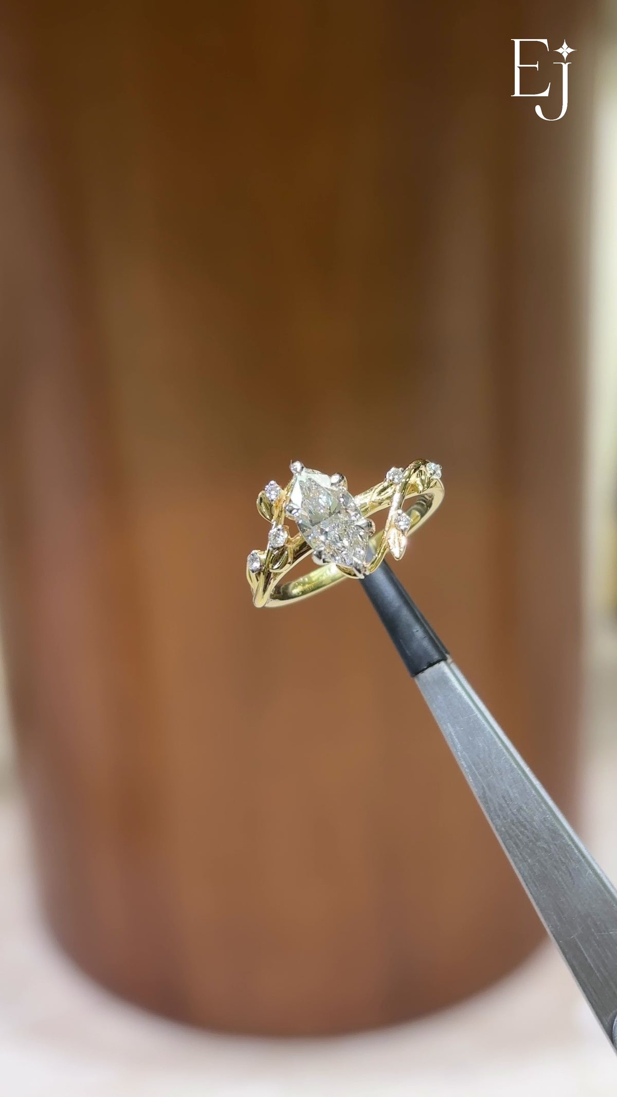 Load video: Marquise Cut Diamond Ring with Leaf Design and Side Accents