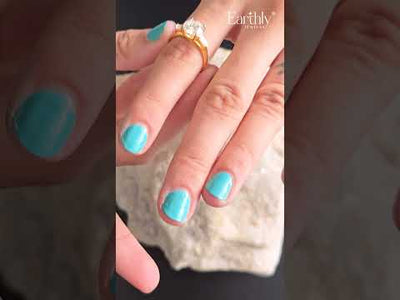 Round Solitaire Engagement Ring With Tapered Baguette | Earthly Jewels